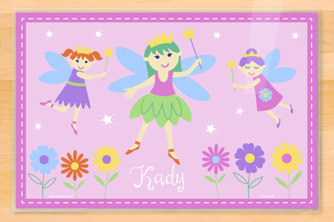 Fairies placemat on pink background with flowers