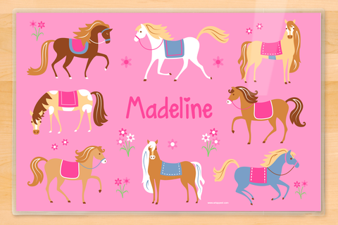 Adorable horses running on pink personalized placemat with little flowers
