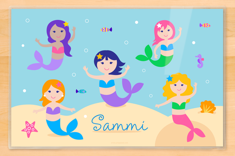 Mermaids with colorful hair swimming with little fish on place mat